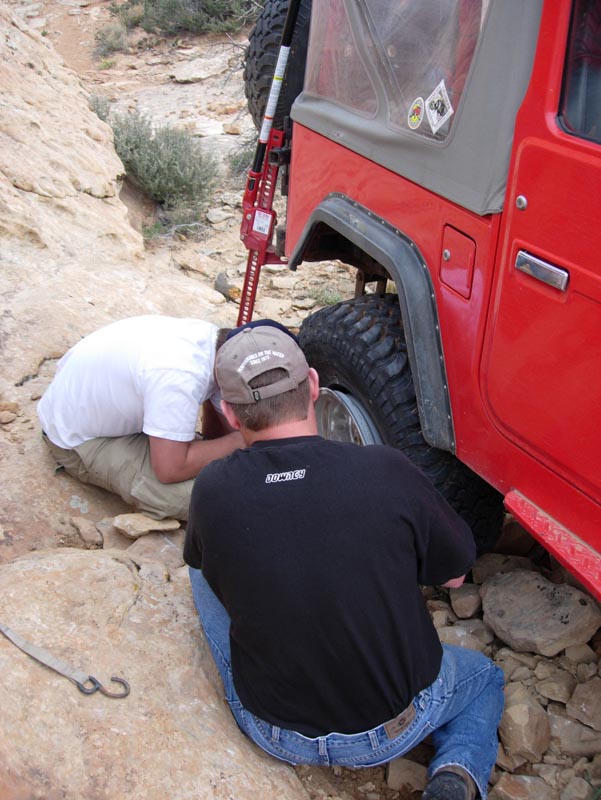 58 Dan and Kurt attempt to reseat the tire